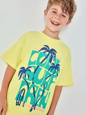 Camiseta amarilla surf